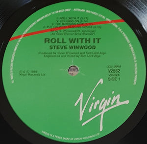 Steve Winwood - Roll With It